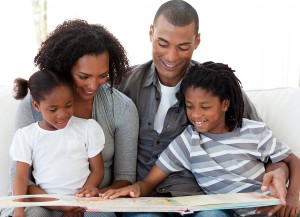 bigstock-Afro-american-Family-Reading-A-6414615